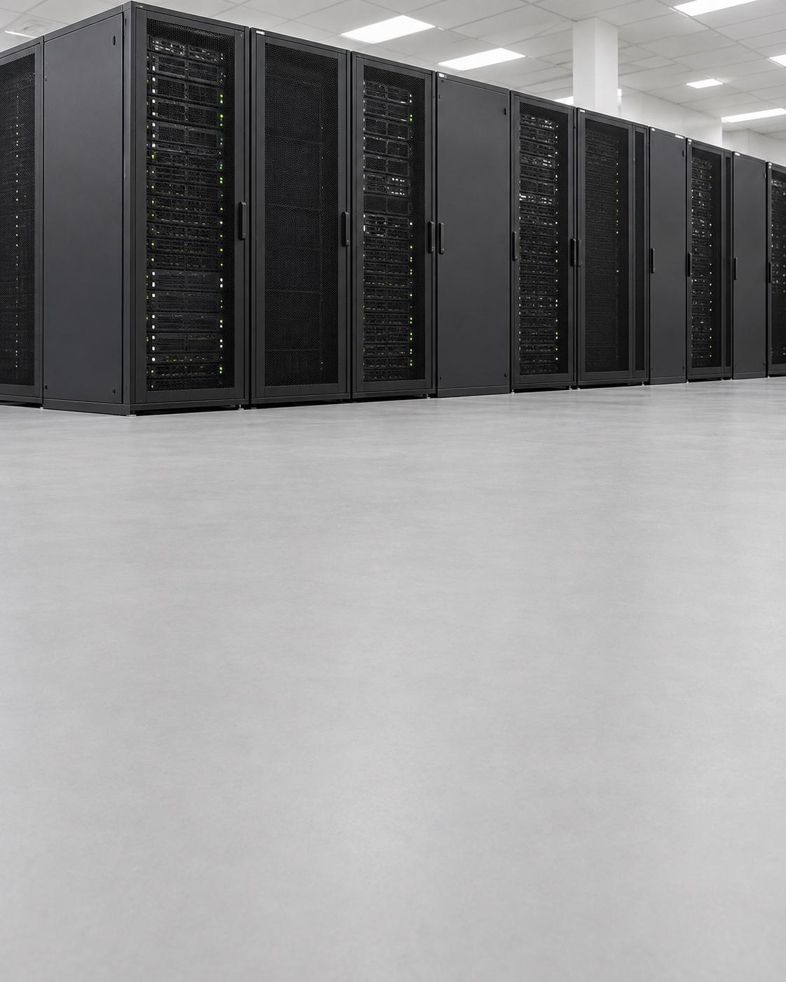 Rows of server racks in a bright modern data center